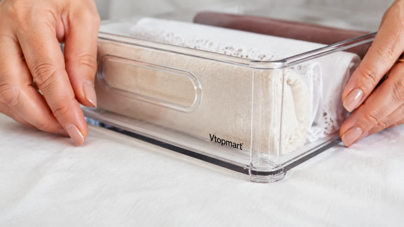 Close-up of clear plastic drawer organizer corner showing smooth edges and consistent wall thickness